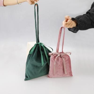 China New Arrival Safety Fashion Women Velvet Travel Lady Bags Drawstring Handle Velvet Shopping Gift Dust Bag With Ribbon for sale