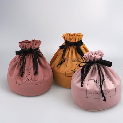 China Safety Custom Emboss Round Bottom Soft Luxury Velvet Gift Candy Christmas Candle Dust Bag Drawstring Velvet for sale