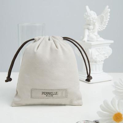 China Custom Security SA8000 GRS Yile Fleece Drawstring Bag With Cotton Sherpa Women Travel Favor Cosmetic Bags for sale