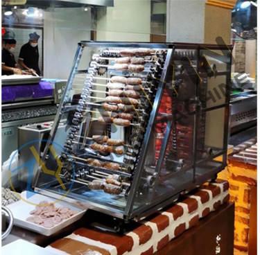 中国 Adjustable speed barbecue machine automatic barbecue electromechanical heating liquefied gas heating custom 販売のため