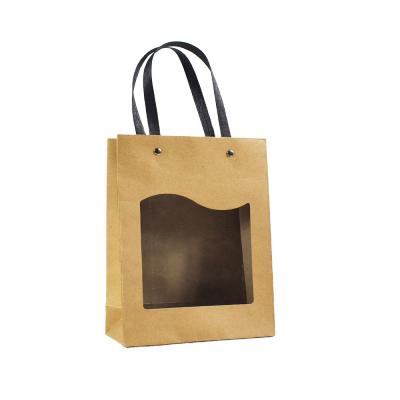 China Surprise Price Recyclable Stock Wholesale Brown Kraft Paper Bag With Transparent PVC Window For Packing Gifts for sale