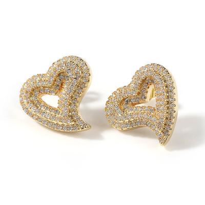 China 2022 Luxury Design D.C.A. Romantic Hollow Zircon Jewelry Hip Hop Love Heart Stud Earrings For Ladies for sale