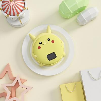 China Cute Mobile Reusable Gel Hand Warmer Portable Hotel Hand Warmer 10000mAh Power Bank Cartoon Rechargeable Hand Warmer for sale