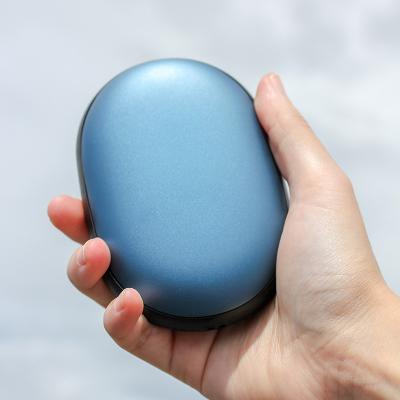 China High Quality Hotel 2022 Rechargeable Hand Warmer Mini 10000AMH USB Reusable Electric Handwarmer with Mobile Power Bank for sale