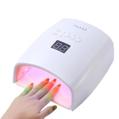 China Plastic Nail Lamp 48W Nail Lamp 48W Gel Lacquer Wireless Professional UV Cordless Manicure Machine Cordless Red Light LED Lamp for sale