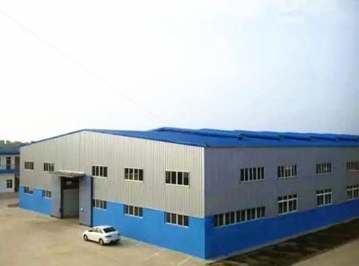 China Portal Frame Prefab Pre Assembled Steel Workshop Building Storage Garage Hot Rolled Section Construction for sale