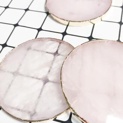 China Round Natural Rose Quartz Crystal Slice Coaster from Europe with Gold Trim Set for sale