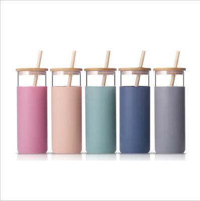 China Sustainable Color Borosilicate Glass Water Bottle With Bamboo Straw for sale