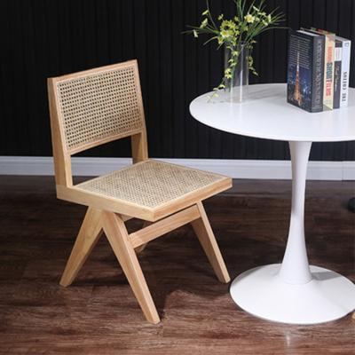 China Hot Sale Modern Black Nature (Other) Restaurant Adjustable Dining Chair Rattan Solid Wood Chairs for sale