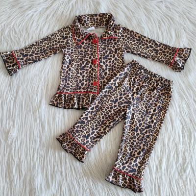 China Breathable Baby Clothes Girl Leopard Veins And Red Button Long Sleeve Pajamas Winter Boutique Set Kids Wear for sale