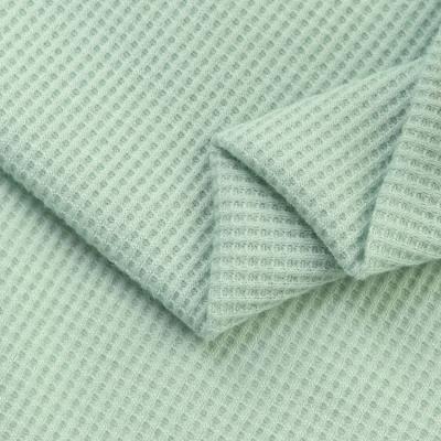 China 65% Organic Polyester 35% Cotton Waffle Blended Knit Plain Dyed Woven Fabric for sale