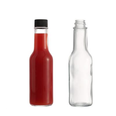 China Hot Selling Custom Sticker Food Label Glass 5oz Chili Hot Sauce Bottles With Screw Lid for sale