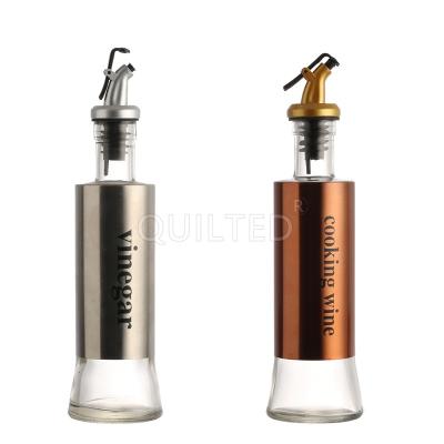 China Luxury Empty Edible Glass Food 300ml Marasca Olive Oil Bottles With Lid Stainless Steel Oil Bottles Glass Bottle For Kitchen for sale