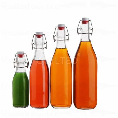 China 250ml 8oz Food Grade Round Recycled Swing Beverage Kombucha Kombucha Glass Tea Juice Beer Soft Drink Bottle With Cap for sale