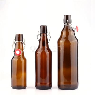 China Beverage 250ml 300ml 330ml 500ml 1000ml beer bottle with swing top lid beverage beer glass wine bottle with cap for sale