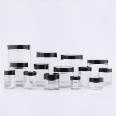 China Custom Round 0.5oz 2oz 4oz 6oz 8oz 12oz 16oz Round Right Side Glass Food Jar With Glossy Lid for sale