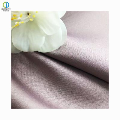 China Eco-friendly Satin 310T 100%Recycled Peach Polyester Satin Tear-Resistant Fabric For Clothes Suits for sale