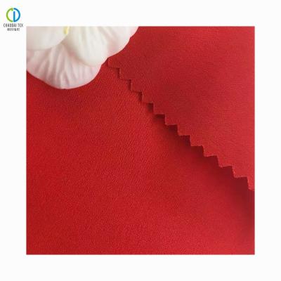 China Red Crepe-back Satin 100%Recycled Polyester Chiffon Shrink-Resistant Fabric For Dress Suits for sale