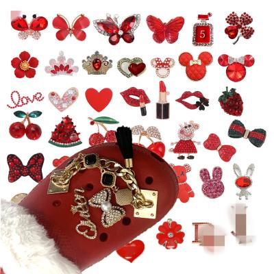 China Custom Clog Charm Hot Fashion Red Metal Lady Style Designer Shoes Decoration Pearl Butterfly Croc Shoes Accessories Fit Hole Sandal Clog Charms for sale