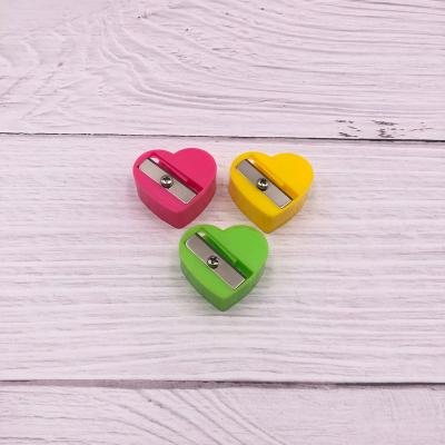 China PS+Metal Single Heart High Quality Cheap Single Hole Plastic Pencil Sharpeners for sale