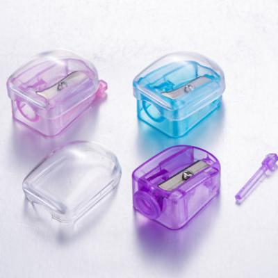 China Plastic + Metal Single Hole Eyebrow Makeup Pencil Sharpener Cosmetics Sharpener With Closure Cap for sale