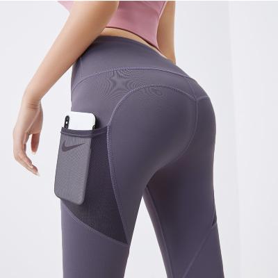 China Ropa Deportiva Breathable Compression Gym Pants With Pocket Fitness Yoga Wear Stretch Fitted Gaiters For Women for sale