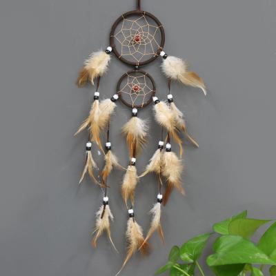 China Europe Hand Knit Double Hoop Dream Catcher Charms Fumigated Feather Pendant For Home Decoration for sale