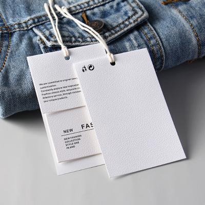 China /Recyclable Wholesale Custom Hole Punched Cardboard Viable Hang Tag Garment Paper Hang Tag For Clothing Own Logo for sale