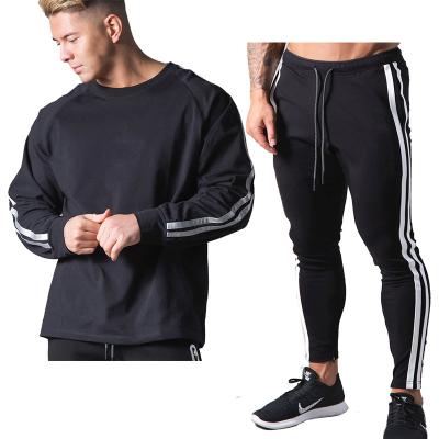 China New Design Breathable Autumn Winter Pull Over Sweatshirts Sets Men Drawstring With Pockets Sports Tracksuit Sets Breathable Tracksuits Men for sale