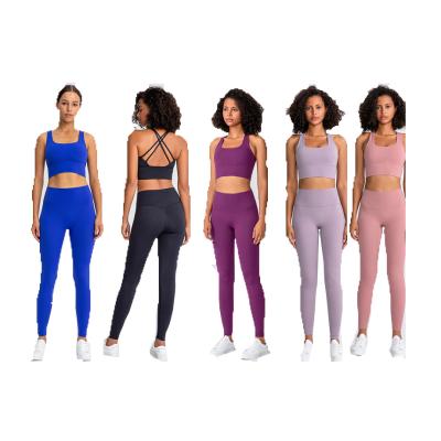 China Top Selling Breathable S-XL 30 Colors Full Back Cross Beauty With Pads Women Autumn Sets No Front Stitching High Waist Pants 2 Pieces Set Women for sale