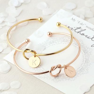 China FASHIONABLE Hot Selling Custom Women's Exquisite Jewelry 26 Initials Disc Knot Bracelet Gold Bangle for sale