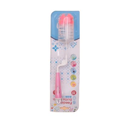 China Sustainable Cute Pattern Baby Bottle Brush Swivel And Bottle Brush Small Teat Bending Brush Hidden In The Handle for sale