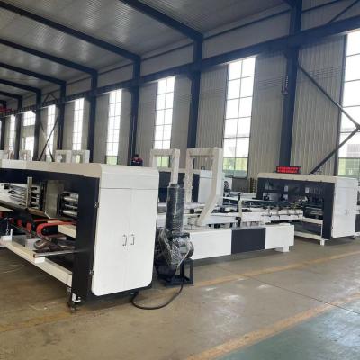 China Carpeta acanalada automática de alta velocidad automatizada Gluer del cartón y máquina de la grapadora en venta