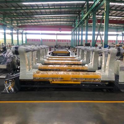 Cina Il rotolo di mulino idraulico automatico di Shaftless sta la linea di produzione ondulata dello strato per rotolo di carta in vendita