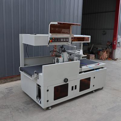 Chine Contrôle PLC POF / PE Machine d'emballage de scellage par film haute performance personnalisée à vendre