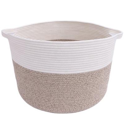 China Multifunctional Sustainable High Quality Decorative Cotton Rope Storage Solid Color Woven Basket With Handles for sale