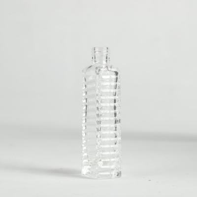 China Cosmetic Wholesale Cheap Price Glass Bottle Transparent Molded Perfume Bottle for sale