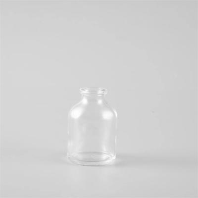 China Medicine Wholesale Cheap Price Penicillin Transparent Molded Glass Bottle 30ml for sale