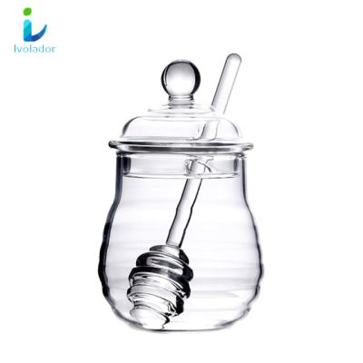 China New Type Viable Design Honey Pot Glass Honey Jar With Lid Dipper Sticks And Cover Honey Containers Holder for sale