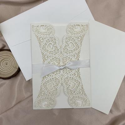 China Luxury White Europe Pearl Paper Laser Cut Wedding Invitations for sale