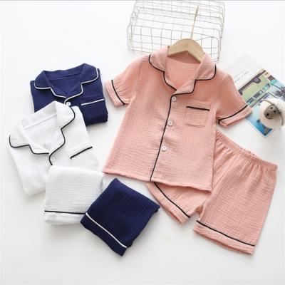 China Wholesale Breathable Kid Summer Baby Sleeve Cotton Sleepwear Muslin Pijamas Short Home Use Children Pajamas for sale