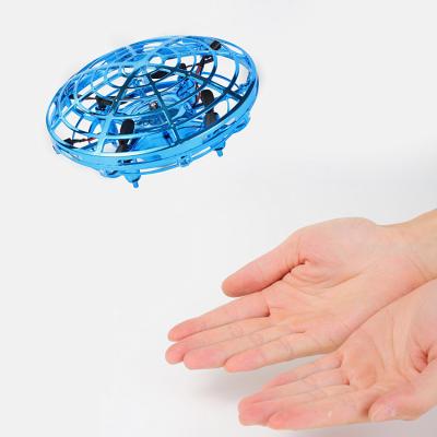 China 2021 New Arrival Children's Toys Interactive Quadcopter Drone Infrared Induction Aircraft Drone With Hand Control UFO Mini Toy With LED Light for sale