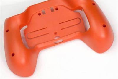 China Elastic Polyurethane Vacuum Casting Parts LRIP Plastic Handle Game Console Grips for sale