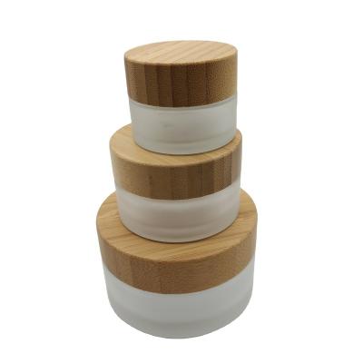 China 5ml 15ml 30ml 50ml 100ml Glass Bottle Facial Skin Care Cosmetic Packaging Eco-friendly Bamboo Cosmetic Jars For Cosmetics for sale