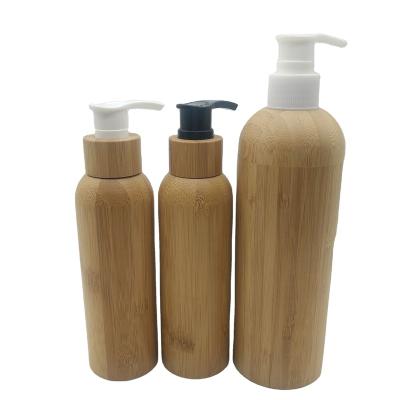 China High Quality Cosmetic 50ml 100ml 250ml Round Shape Bamboo Shampoo Container Lotion Pump Bottle for sale