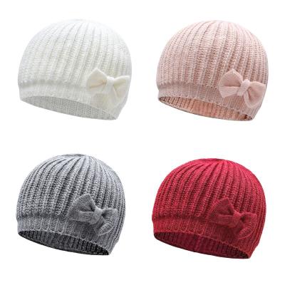 China Picture Factory Wholesale Acrylic Newborn Toddler Beanie Child Child Knitted Hat Butterfly Bow Baby Winter Handcrafted Hats Lovely for sale