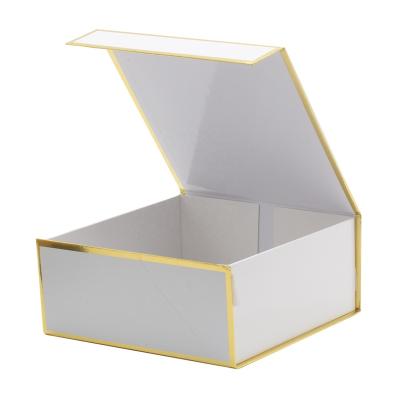 China Hot Sale Recycled Materials White Box With Custom Printing Edge Golden Clam Shell Box With Magnetic Closure For Clothing Shoes Garment Packaging for sale