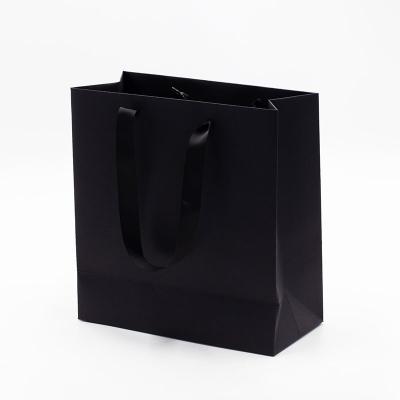 China Wholesale Black Paper Gift Bags Recyclable And Custom Your Logo Printed Luxury Plain Black Color With Clothing Box for sale