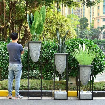 China Mediterranean Black Metal Iron Flower Pots Garden Shelf For Flower Planter Rack Set Corner Pot Rack Metal Rectangle Plant Stand for sale