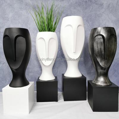 China Nordic Simple Support Fiberglass Large Volume Order Human Face Shape Nordic Simple Machine-made Glass Vase and Gift for sale